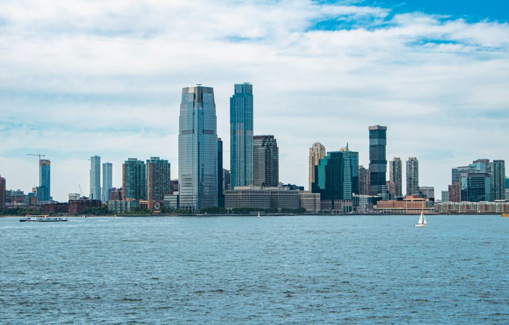 A large body of water with a city in the background