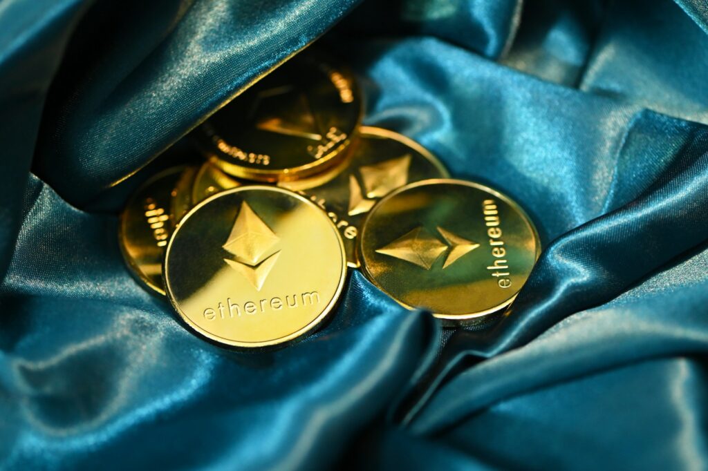 a close up of some gold buttons on a blue cloth