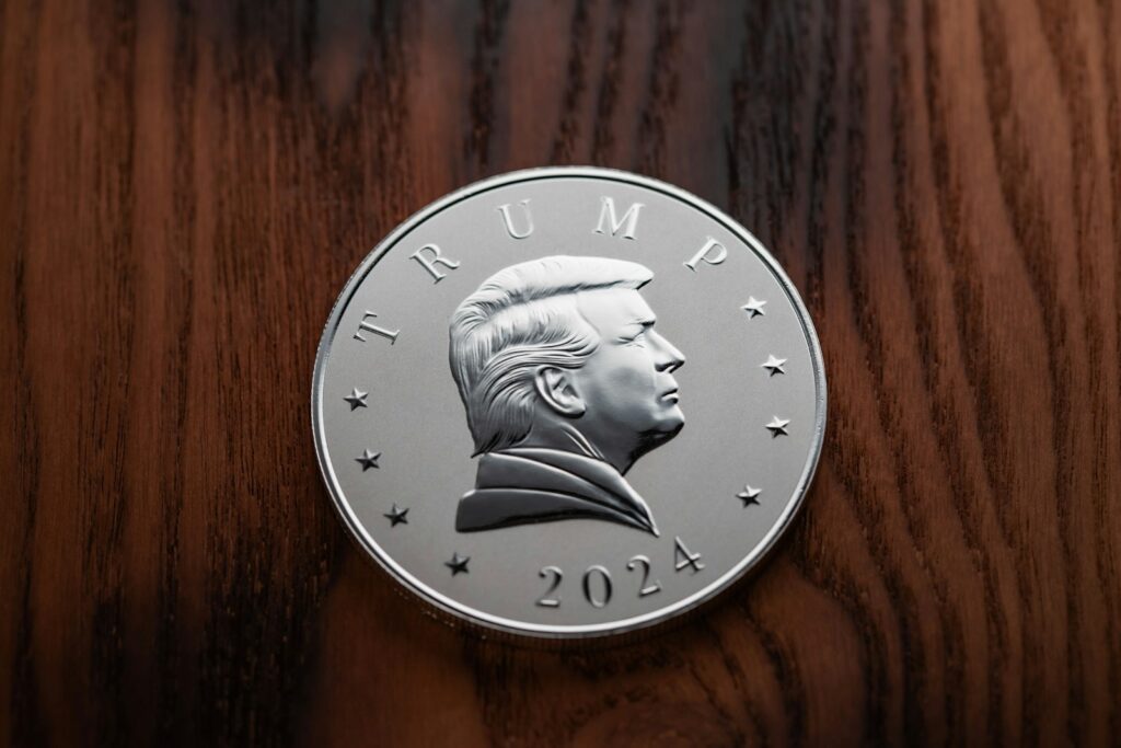 a close up of a coin on a wooden surface