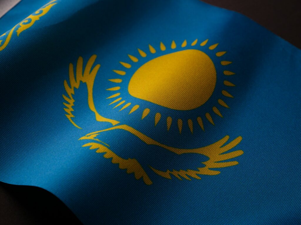 a close up of the flag of the state of kazakhstan