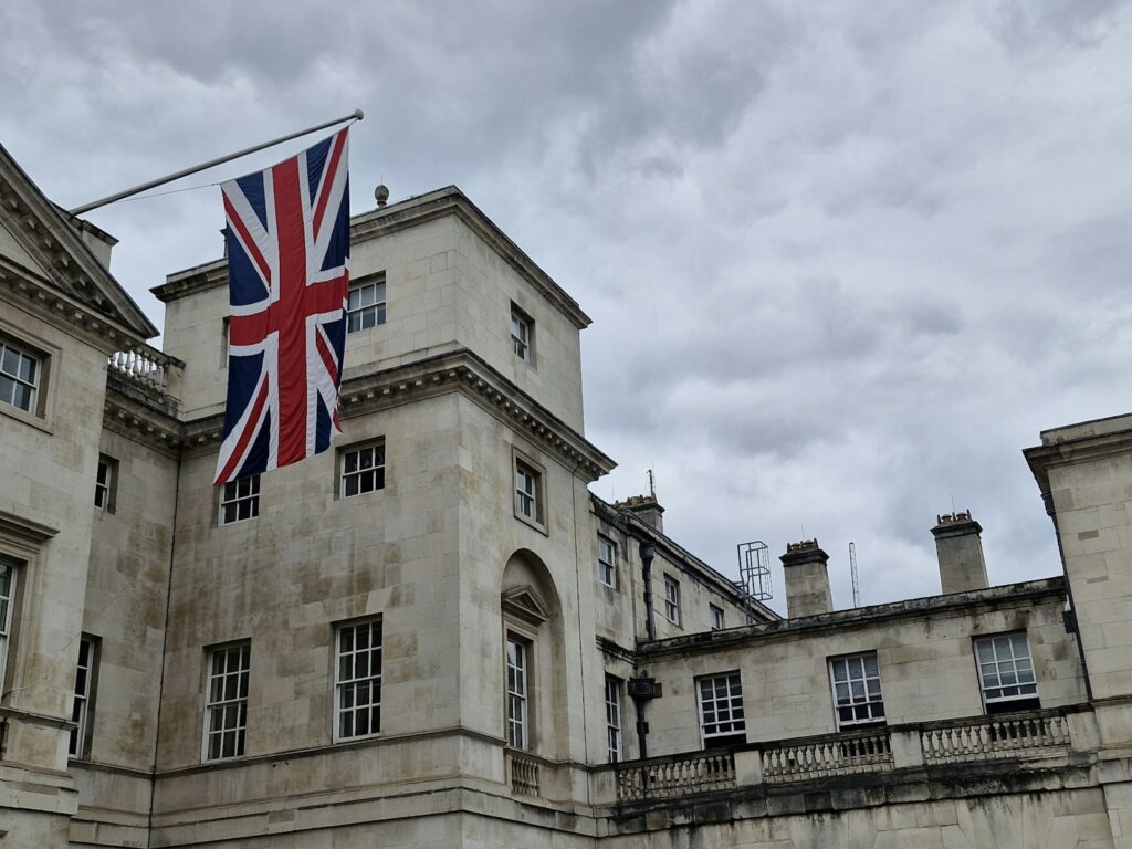A large building with a flag on top of it