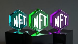 three glass blocks with different letters on them