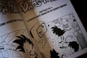 Dragon ball manga pages with characters watching television