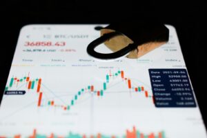 a close up of a business card with a stock chart on it