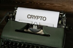 a close up of a typewriter with a paper on it