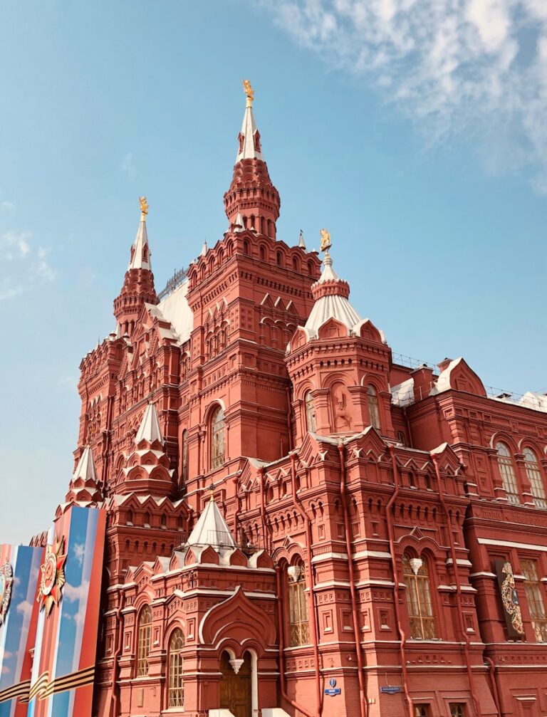 low-angle photography of red cathedral