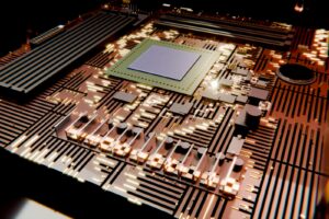 A glowing computer circuit board with a central processing unit.