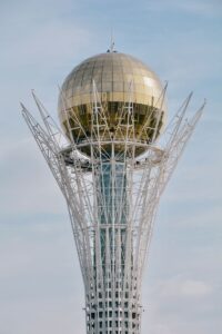 Capture of the iconic Baiterek Tower, symbol of Astana, with a clear blue sky backdrop.