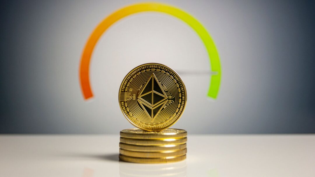 Stack of Ethereum coins with a color gradient background signifying cryptocurrency dynamics.