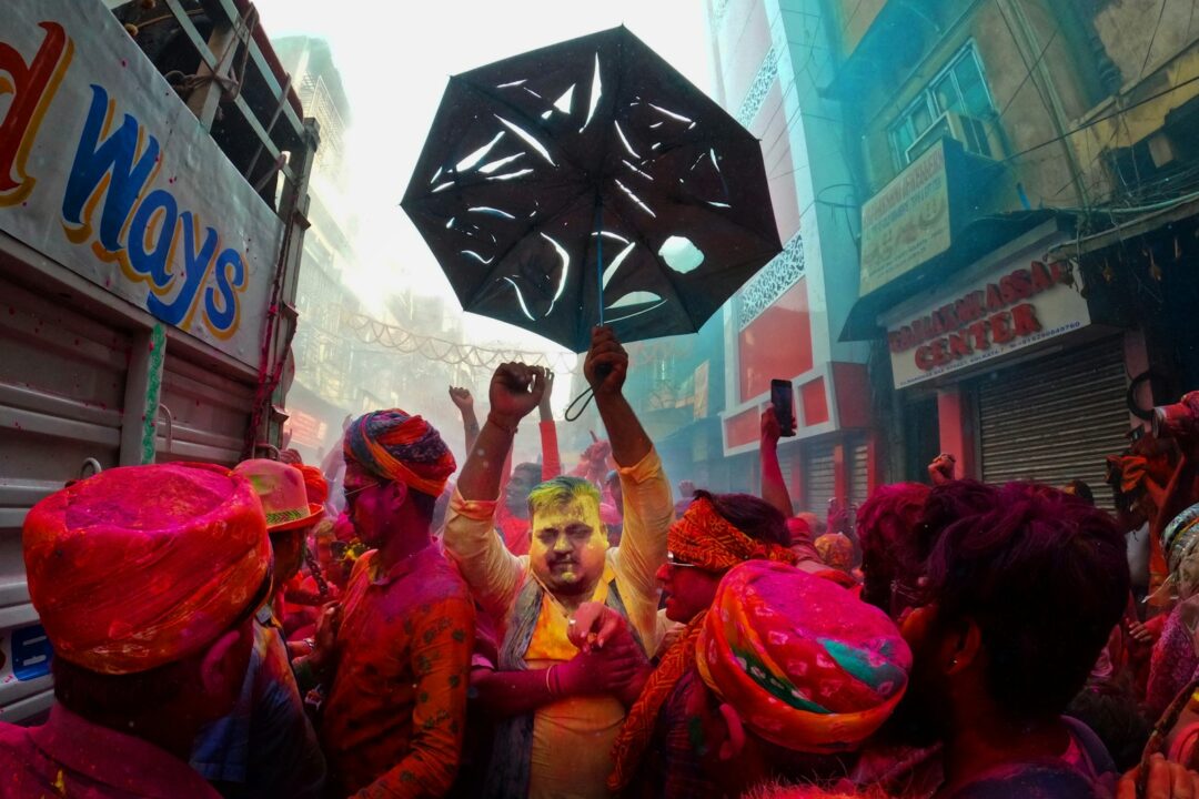 a group of people with colored paint on their faces